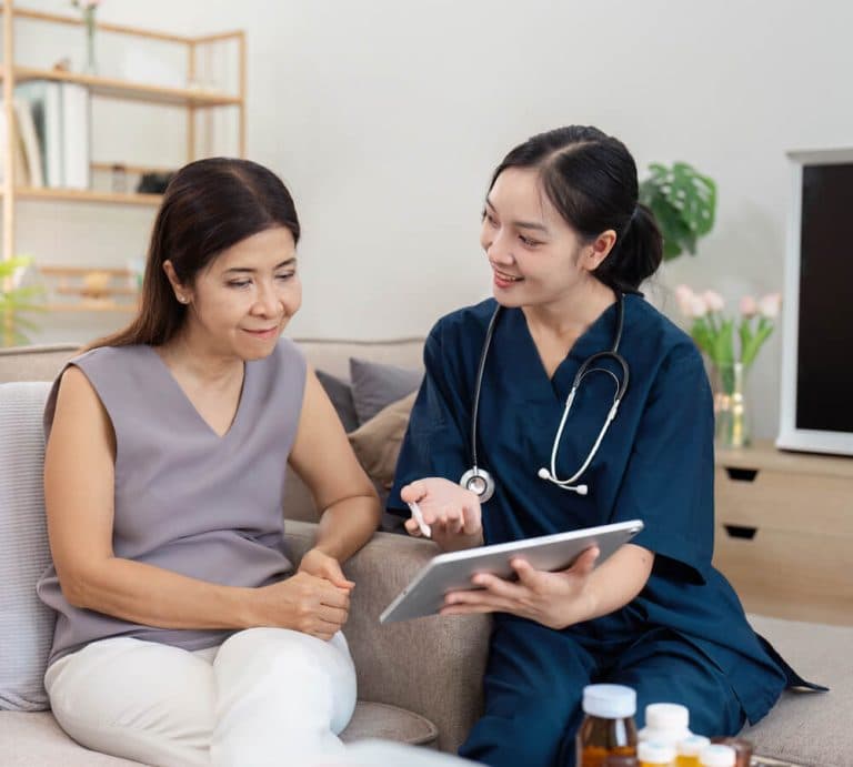 NDIS support professional assisting a participant